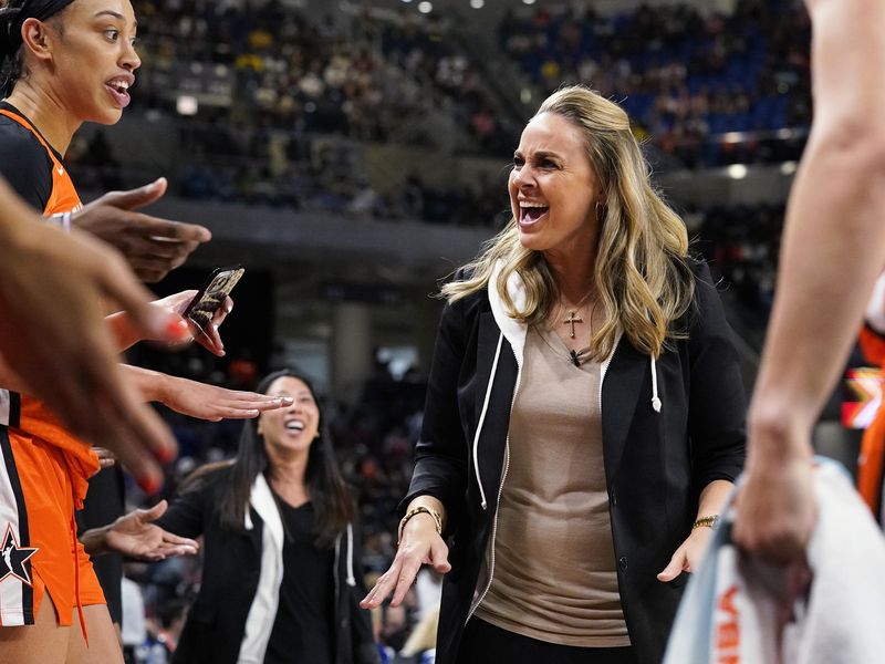Las Vegas Aces head coach Becky Hammon talks to players during WNBA All-Star Game