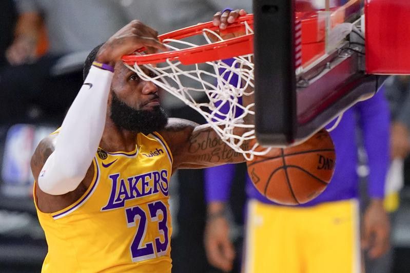 LeBron James of Los Angeles Lakers dunks against Miami Heat