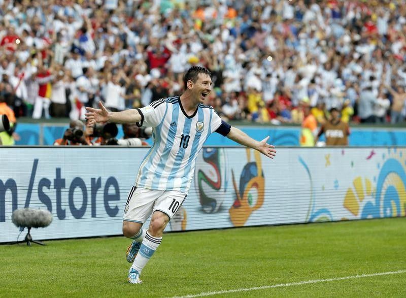 Lionel Messi celebrates after scoring goal at the 2014 World Cup in Brazil