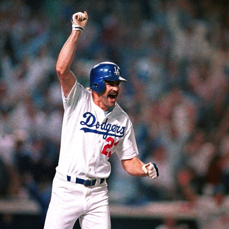 Los Angeles Dodgers slugger Kirk Gibson celebrates hitting a home run