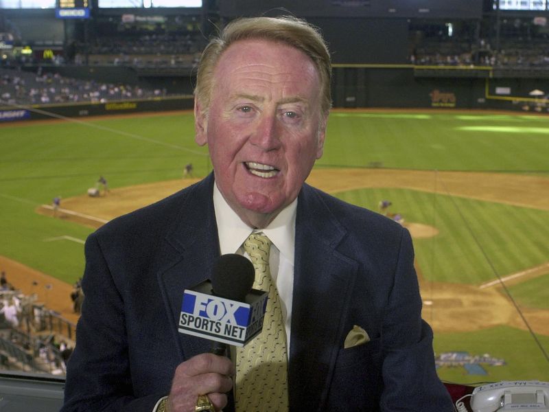 Los Angeles Dodgers television play-by-play announcer Vin Scully rehearses