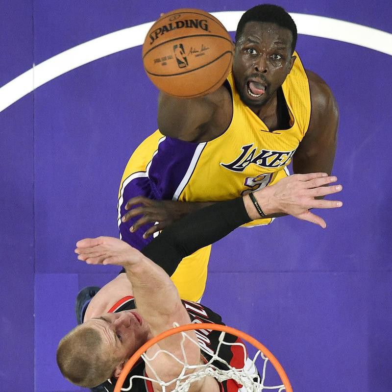 Los Angeles Lakers forward Luol Deng shoots