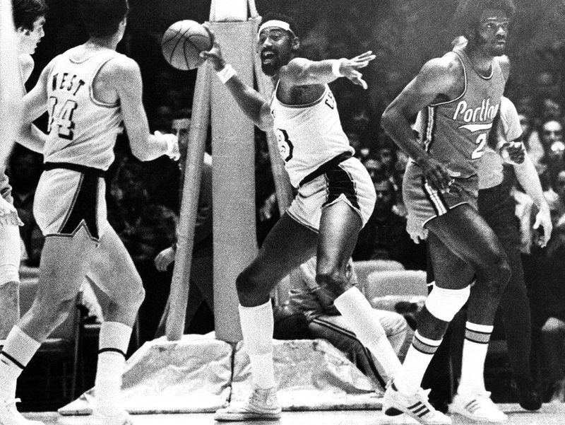 Los Angeles Lakers Wilt Chamberlain passes the ball