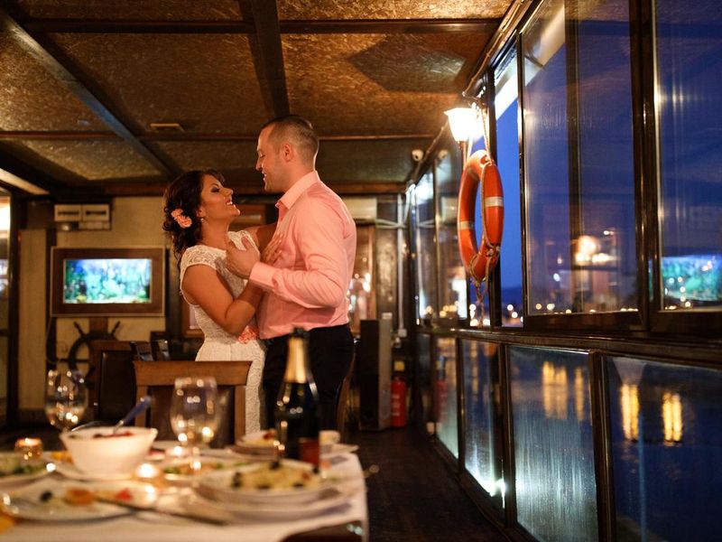 Loving couple dancing in restaurant