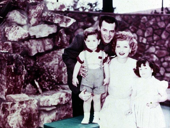 Lucille Ball is pictured with her husband Desi Arnaz and their two children, Desi Jr. and Lucie, in Los Angeles, 1955
