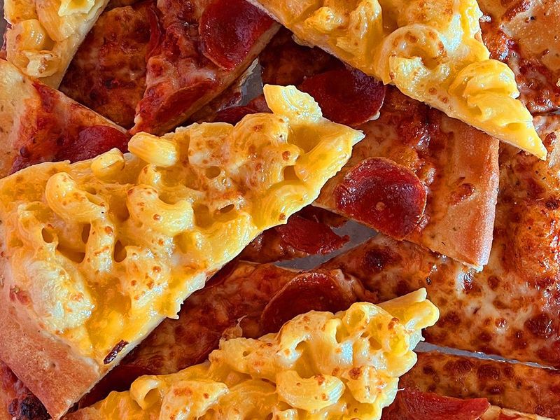 Macaroni, pepperoni and cheese pizza slices from Cicis