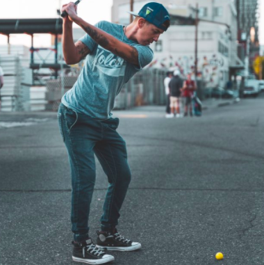 Man playing urban golf