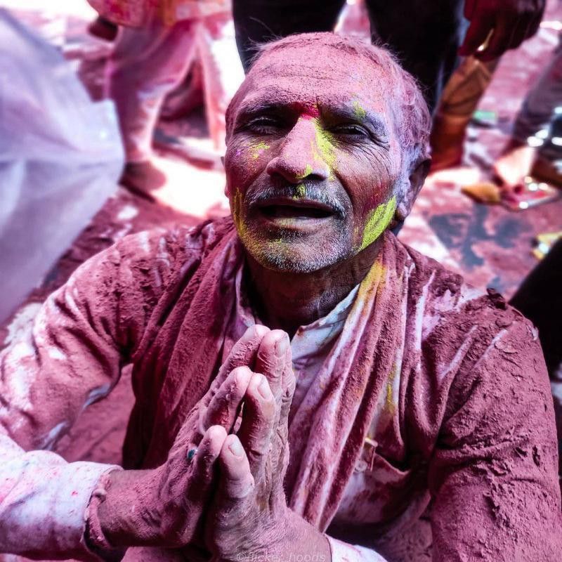 Man praying during Holi