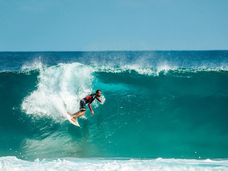 Man surfing wave in Brazil