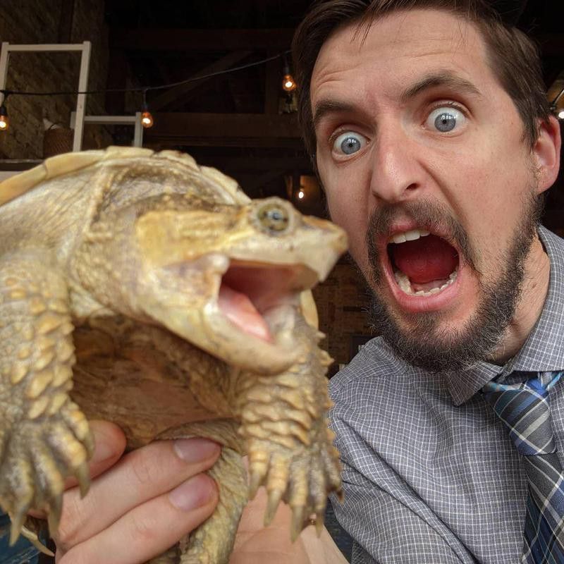 Man with his pet turtle