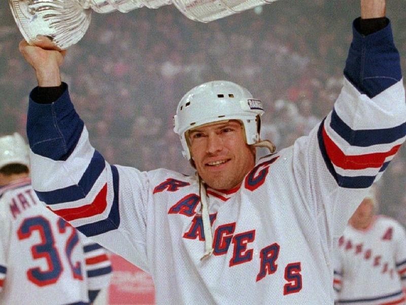 Mark Messier holds the 1994 Stanley Cup trophy