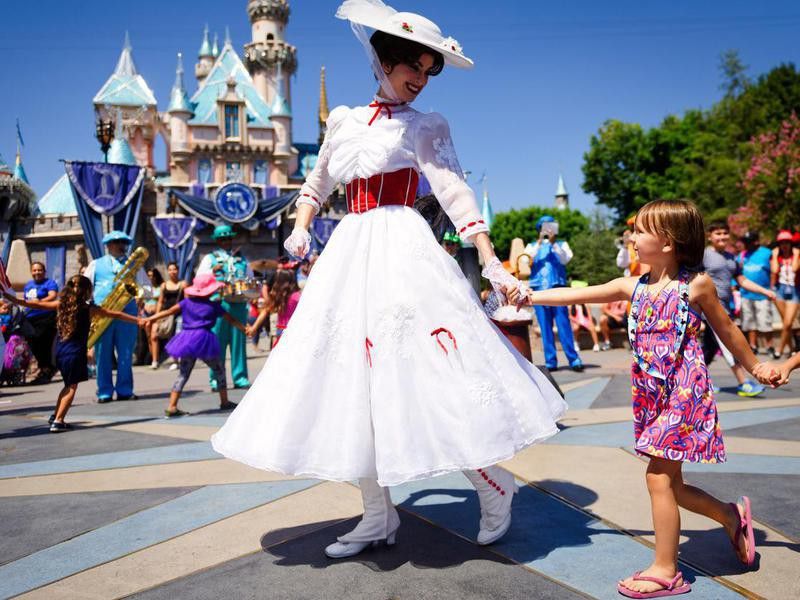 Mary Poppins with girl at Disnelyland