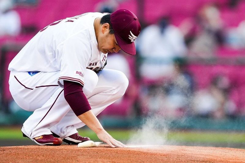 Masahiro Tanaka touches the mound