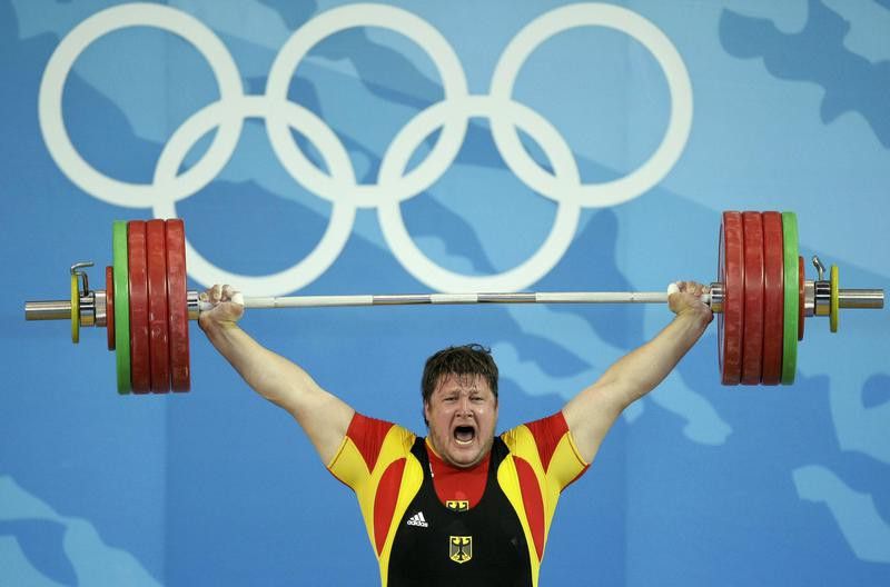 Matthias Steiner of Germany lifts