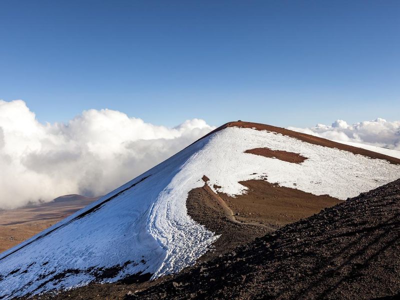 Mauna Kea volcano peak snow capped, big island hawaii