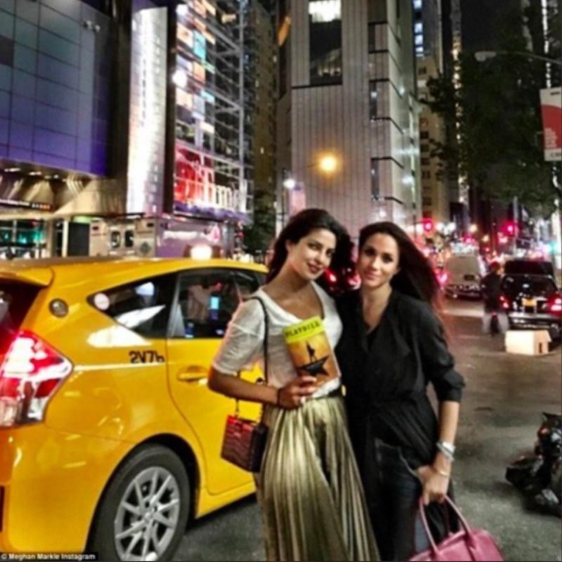Meghan Markle and Priyanka Chopra with playbill in New York