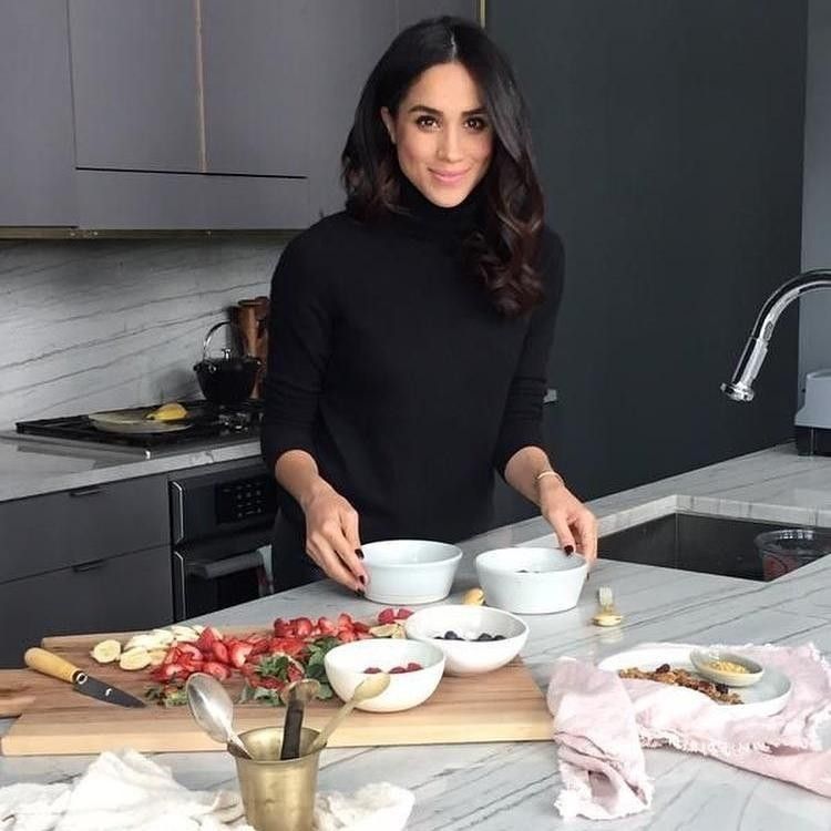 Meghan Markle cooking in the kitchen