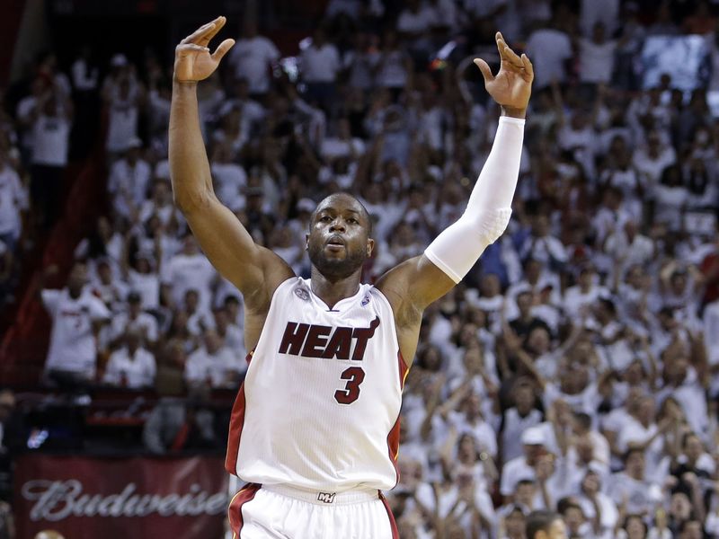 Miami Heat shooting guard Dwyane Wade celebrates basket during second half of Game 7