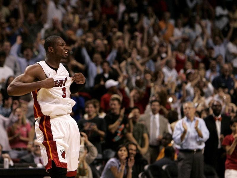 Miami Heat's Dwyane Wade begins to celebrate
