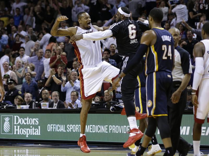 Miami Heat's Rashard Lewis celebrates with Miami Heat's LeBron James