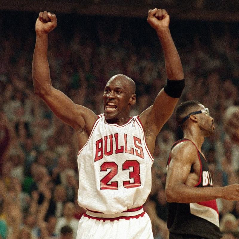 Michael Jordan celebrates the Bulls win