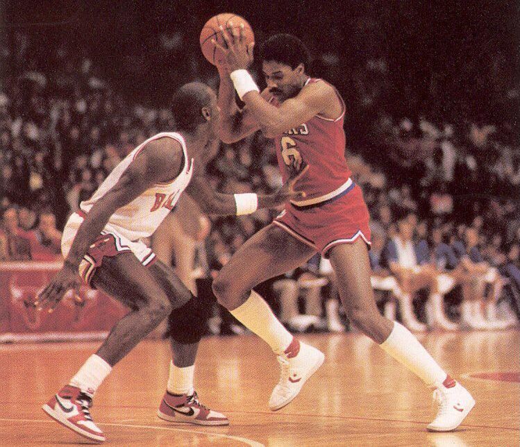 Michael Jordan wearing Air Jordans against Julius Erving