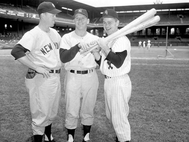 Mickey Mantle, Gil McDougald, and Nellie Fox pose