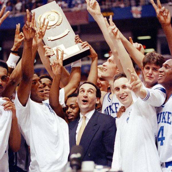 FILE - In this April 7, 1992, file photo, Duke coach Mike Krzyzewski and his team celebrate after defeating Michigan 71-51 in the NCAA Final Four Championship game in Minneapolis. His national championships came in 1991, 1992, 2001, 2010 and now 2015. (AP Photo/Jim Mone, File)