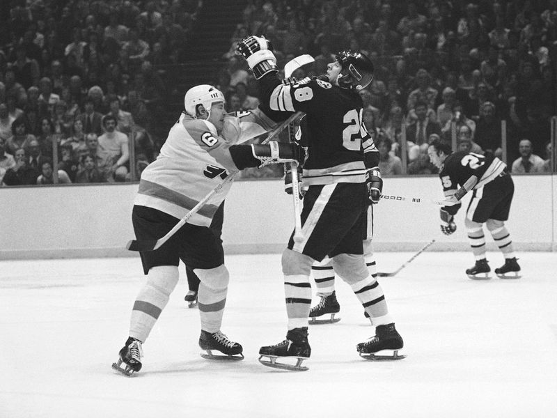 Mike Milbury and Andre Dupont fight