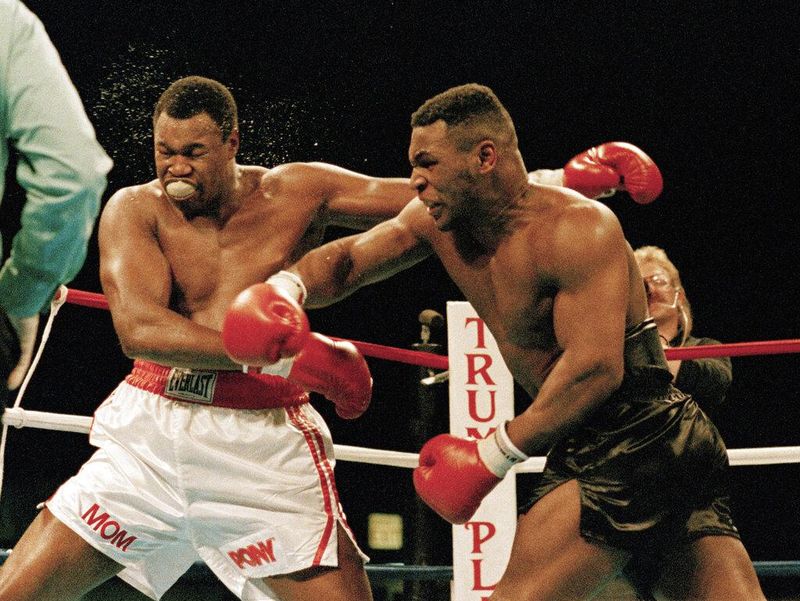 Mike Tyson and Larry Holmes in 1988
