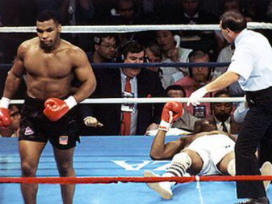 Mike Tyson walks away from Mike Spinks