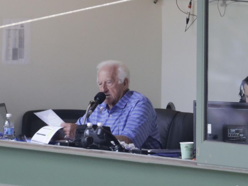 Milwaukee Brewers radio announcer Bob Uecker in booth during first inning