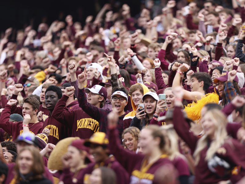 Minnesota fans in the student section at a football game in Minneapolis
