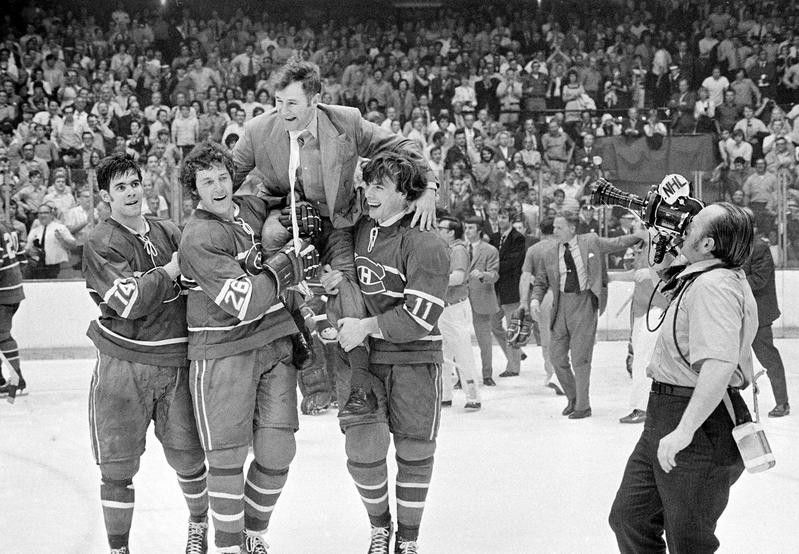 Montreal Canadiens coach Al McNeil carried by players