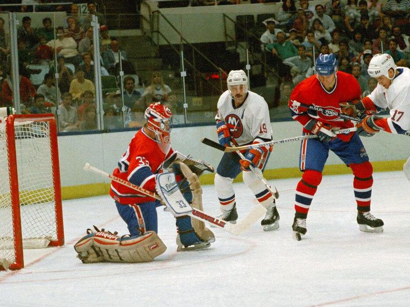 Montreal Canadiens Mike Lalor, right, and goalie Patrick Roy