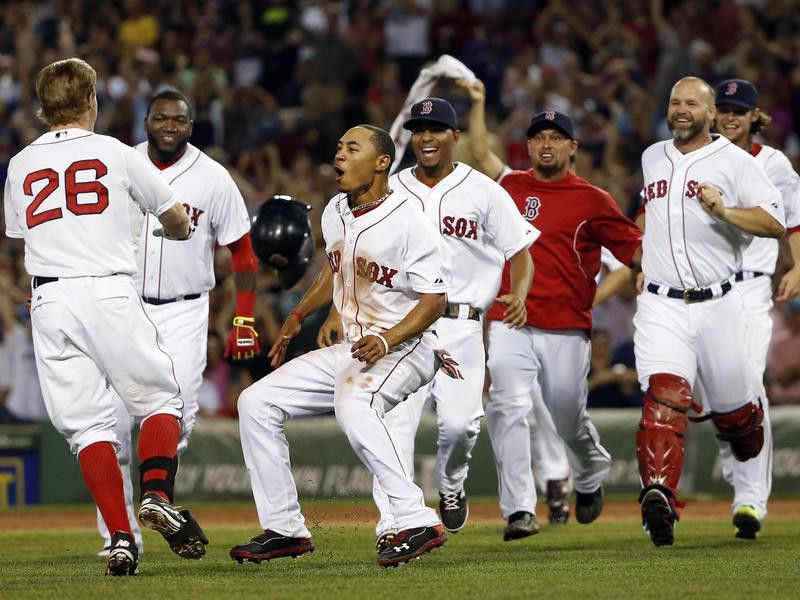Mookie Betts celebrating with team