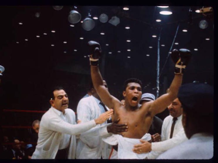 Muhammad Ali celebrating