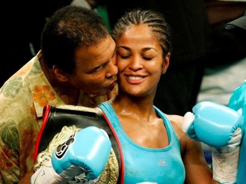 Muhammad Ali embraces Laila Ali