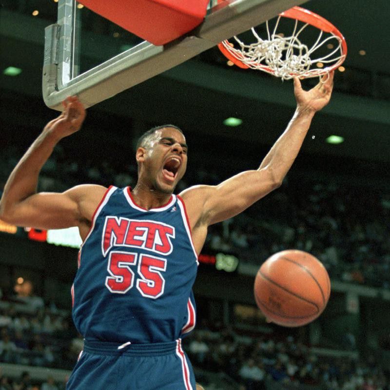 New Jersey Nets' Jayson Williams yells out after dunking