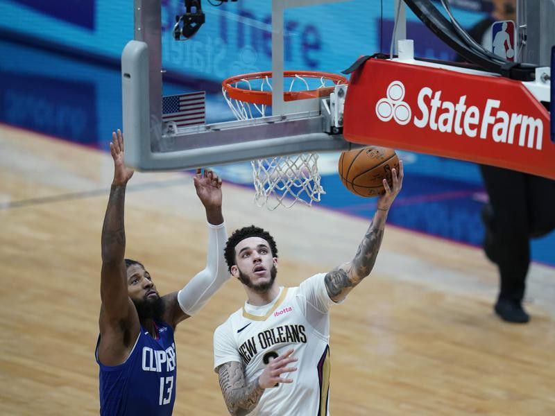 New Orleans Pelicans guard Lonzo Ball goes to basket against LA Clippers