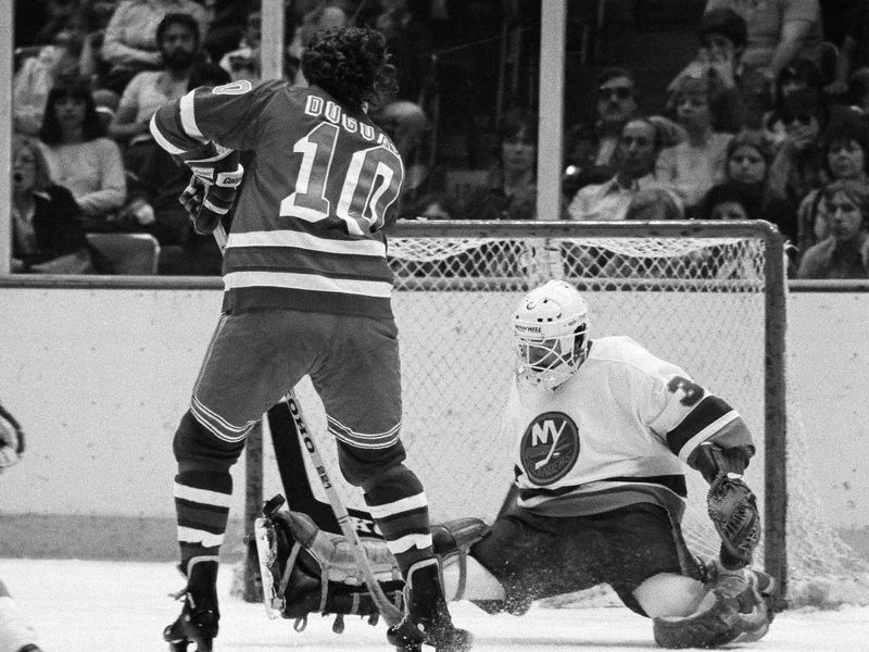 New York Islanders goalie Billy Smith in action
