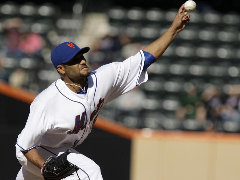 New York Mets' Johan Santana delivers a pitch