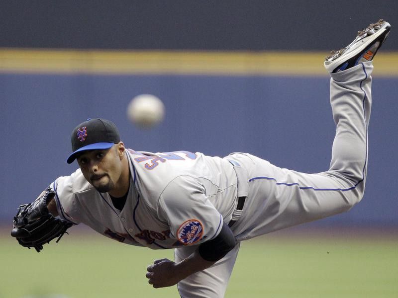 New York Mets starting pitcher Johan Santana throws during first inning
