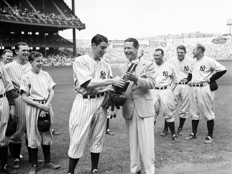 New York Yankees center fielder with movie star Joe E. Brown