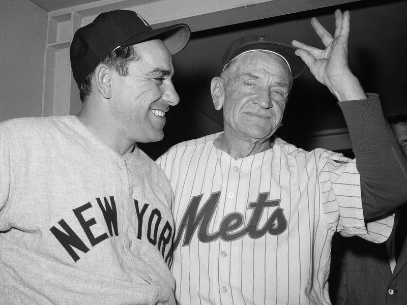 New York Yankees manager Yogi Berra and New York Mets manager Casey Stengel interacting