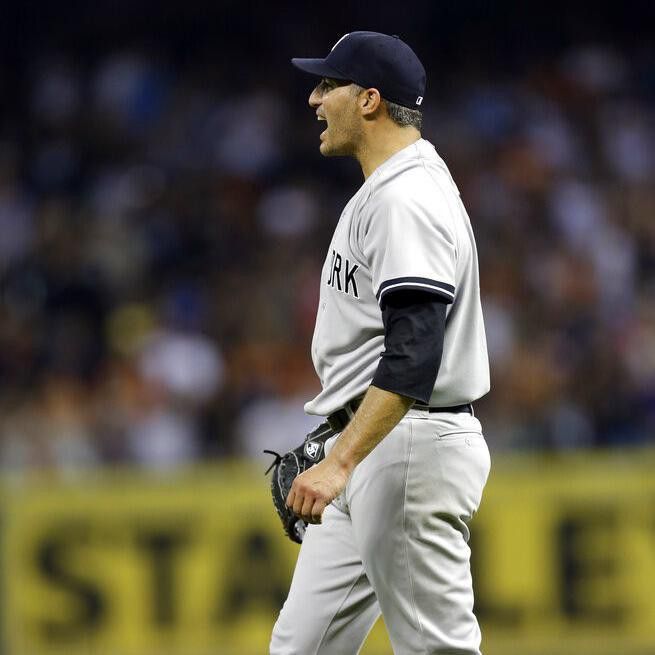 New York Yankees starting pitcher Andy Pettitte reacts