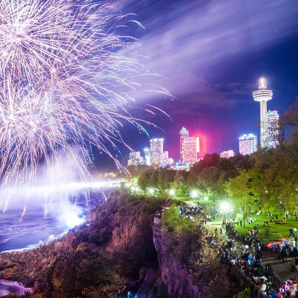Niagara Falls fireworks and light show at dusk on Victoria day, National Holiday in Canada.