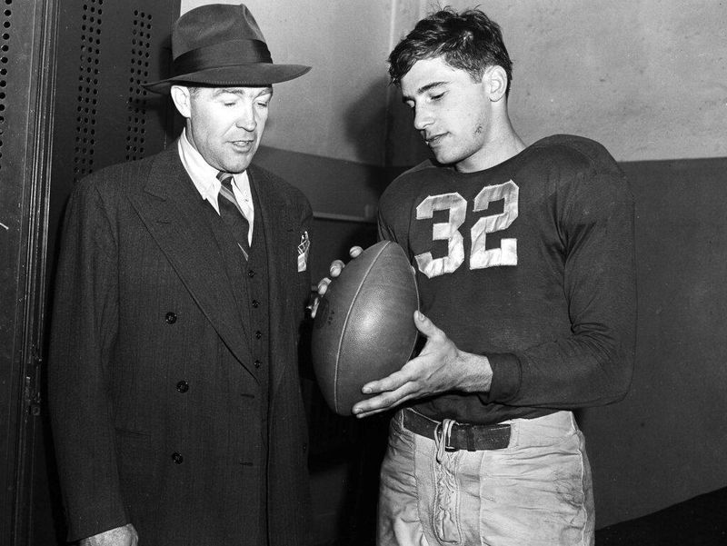 Notre Dame head coach Frank Leahy and quarterback Johnny Lujack