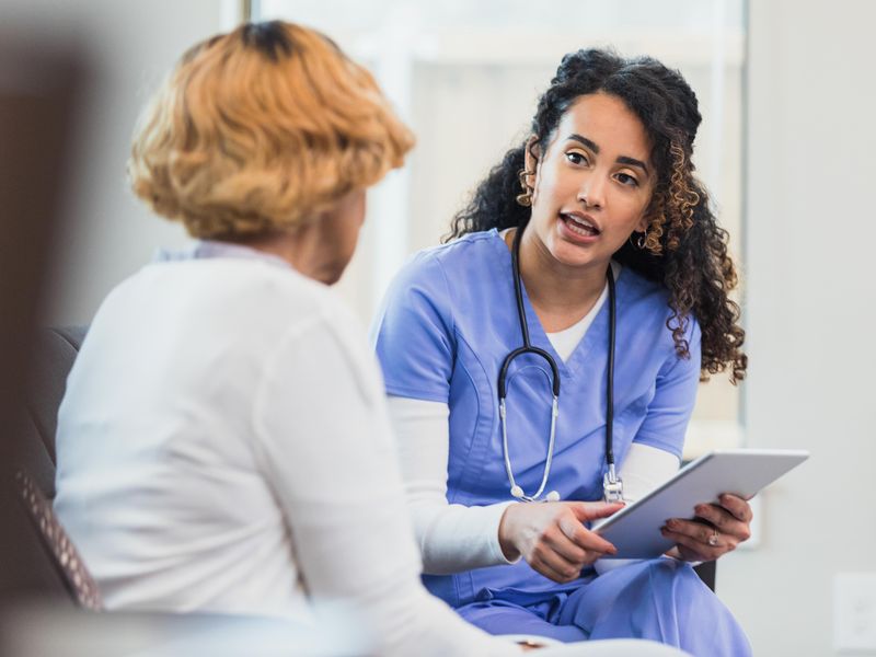 Nurse discussing test results with patient