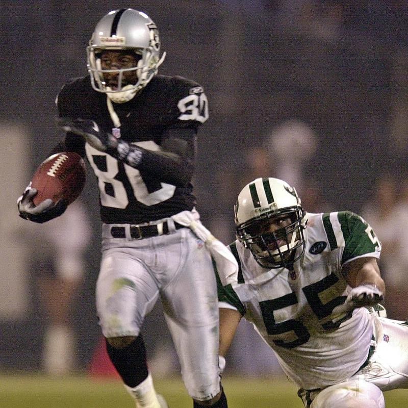Oakland Raiders' Jerry Rice makes a 47-yard catch